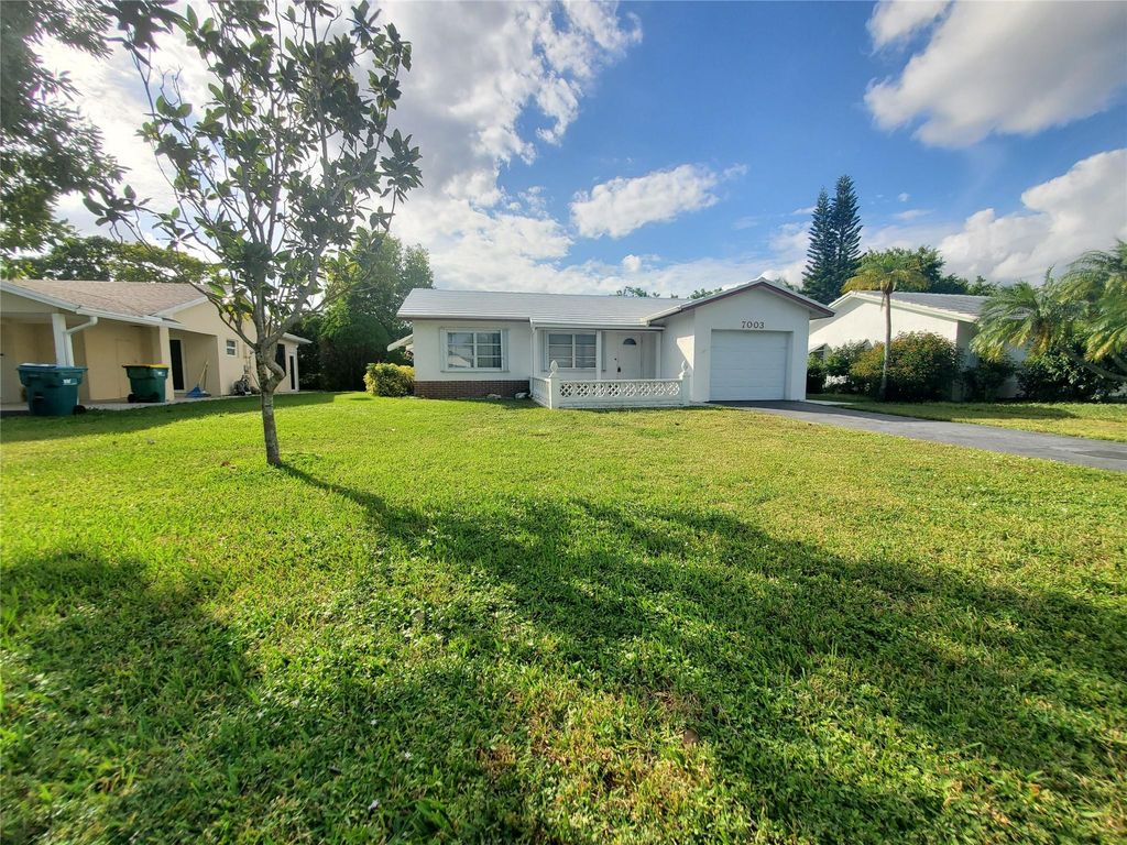 Photo of 7003 NW 94th Ter, Tamarac, FL 33321 (MLS # F10541475)