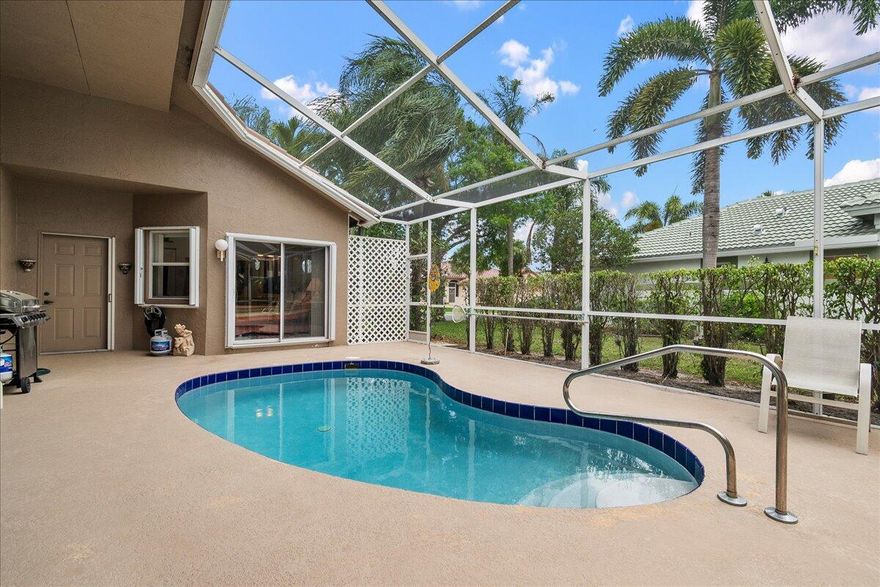 New roof (2025) and private guest suite! Rare 3BR/3BA courtyard pool home with 2-car garage in the guard-gated community of River Bridge. This desirable layout features a 2BR/2BA main home plus a separate 1BR/1BA guest suite with its own entrance—perfect for guests, in-laws, or a home office. The main home offers a split-bedroom floor plan, large walk-in closets, jacuzzi tub, upgraded kitchen with new quartz countertops, separate laundry room, and screened patio overlooking the private courtyard pool. A/C approx. 3-3.5 years old and water heater approx. 4 years old. River Bridge offers resort-style amenities including heated pools, tennis, pickleball, clubhouse, and activities. HOA includes landscaping, cable, and internet. Convenient to Turnpike, I-95, Wellington, shopping, and dining.