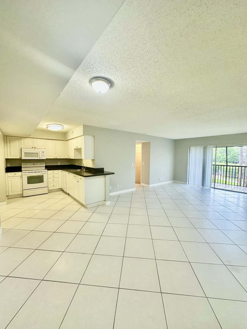 Photo of 4120 Union Square Boulevard #C1, Palm Beach Gardens, FL 33410 (MLS # B26029455)