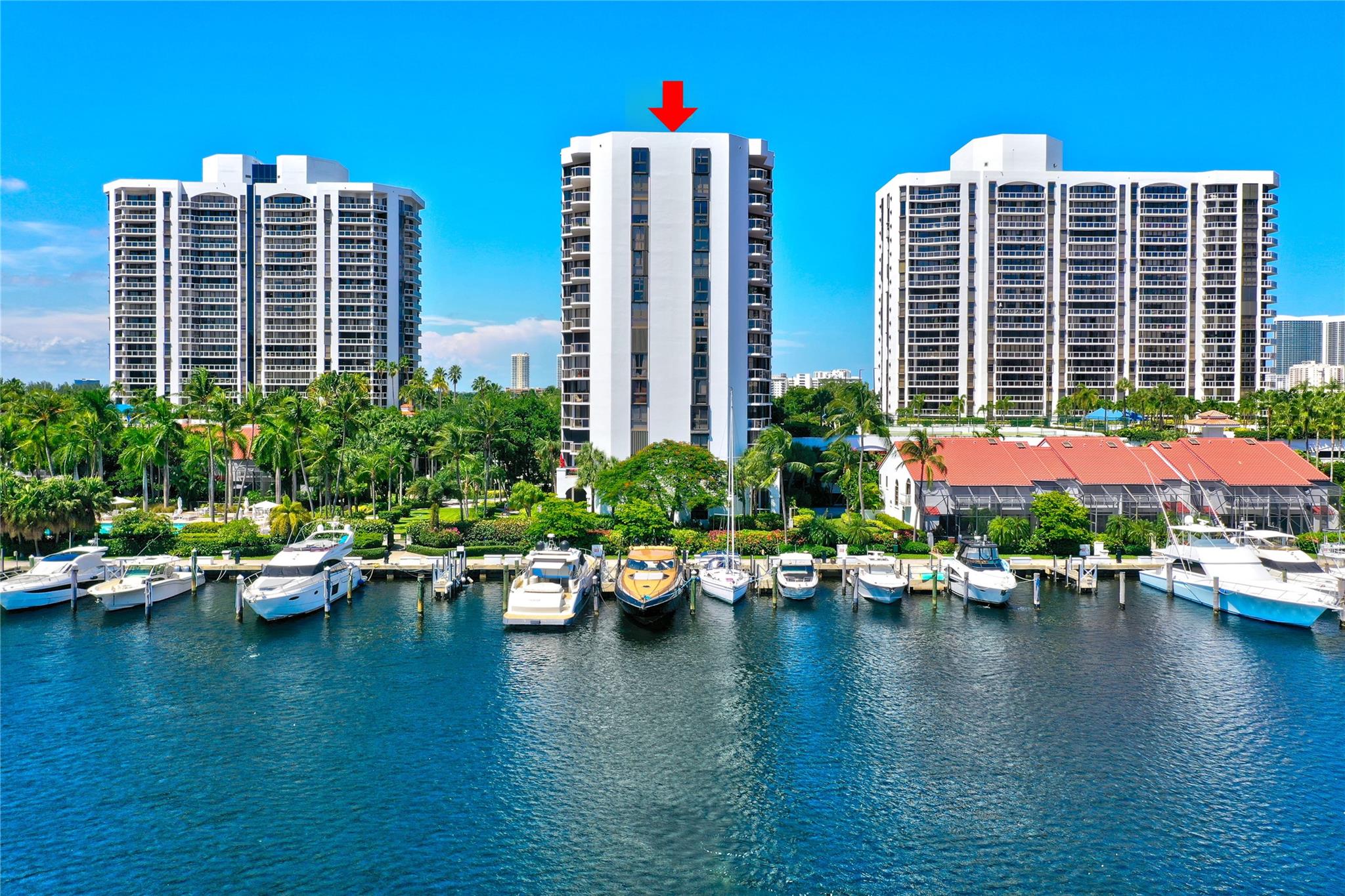 Looking for luxury living, impact windows and stunning water views look no further. This beautiful 2 bed 2 bath washer/dryer in unit, and cover garage is located in the heart of Aventura. Living room features floor-to-ceiling windows, allowing natural light to illuminate in, while the tray ceiling adds an elegant touch. Kitchen is equipped with high-quality white cabinetry, light countertops, and modern appliances, ideal for culinary enthusiasts. Upscale tile throughout and so many more upgrades. The Primary bedroom features multiple windows, walk-in closet, a specious bathroom with double sinks, tub and shower. This beauty features a private balcony with breathtaking water views and endless sunsets. Resort-style amenities; pool, gym, 24-hr security & direct access to Waterways Marina.