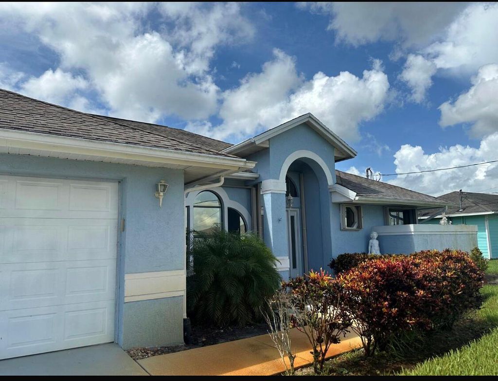 Photo of 434 SW Jeanne Avenue, Port Saint Lucie, FL 34953 (MLS # R11009474)