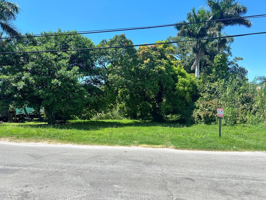 Discover the potential of this 0.43-acre vacant lot ideally situated on the skirts of Lake Okeechobee. Located in the heart of Pahokee and offers a unique balance of visibility, accessibility, and proximity to Florida's largest freshwater lake. With Commercial Core zoning, the site allows for a wide range of uses, including retail or convenience storefronts, professional or medical offices, mixed-use spaces combining business and residential, restaurants, cafes, or entertainment venues catering to lake traffic. Its location makes it perfect for tapping into both community needs and tourist activity around the lake. Whether you envision a thriving business hub, a mixed-use project, or a gathering space, this lot is a a prime investment in Pahokee's growth corridor.