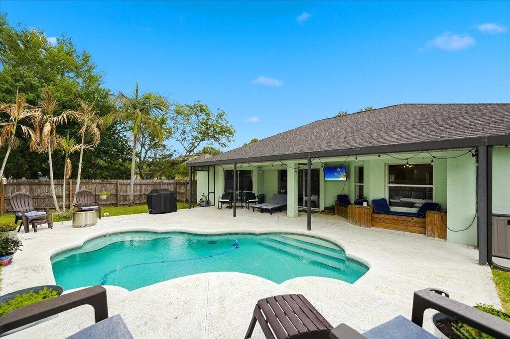 Photo of 314 SW Kestor Drive, Port Saint Lucie, FL 34953 (MLS # B26008638)