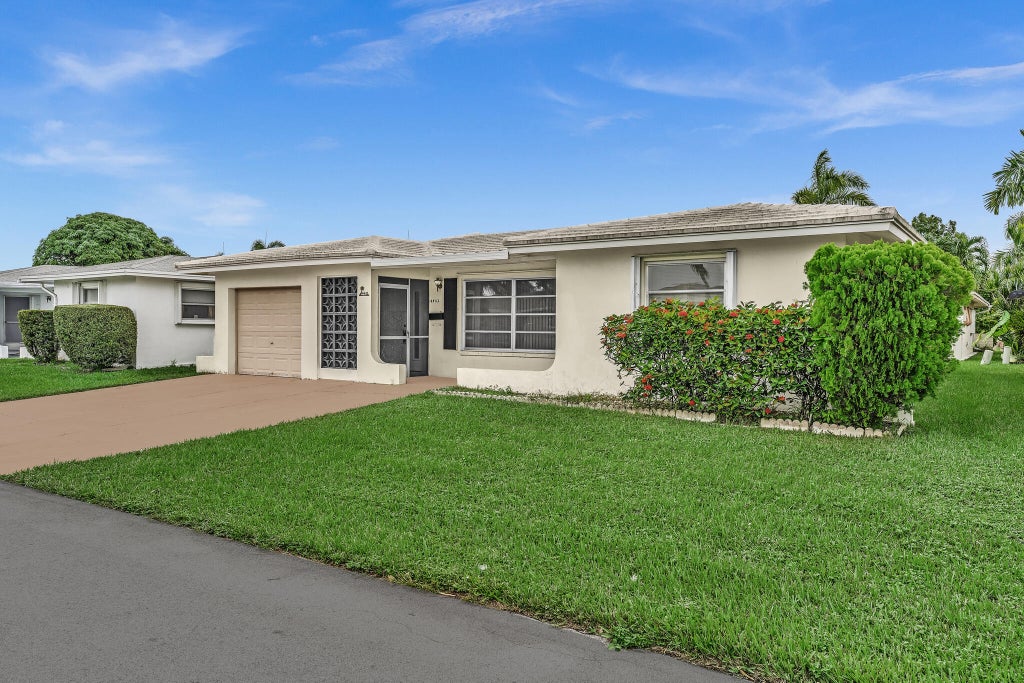 Photo of 4202 NW 43rd Terrace, Tamarac, FL 33319 (MLS # B26091998)