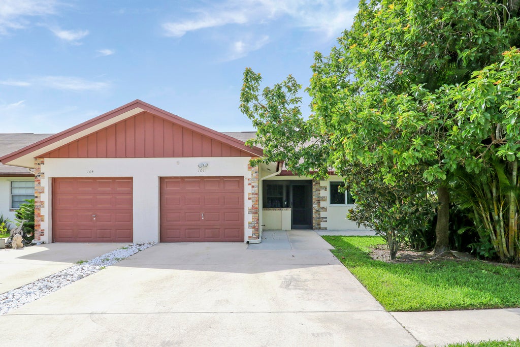 Photo of 106 S Moccasin Trail, Jupiter, FL 33458 (MLS # R11073225)