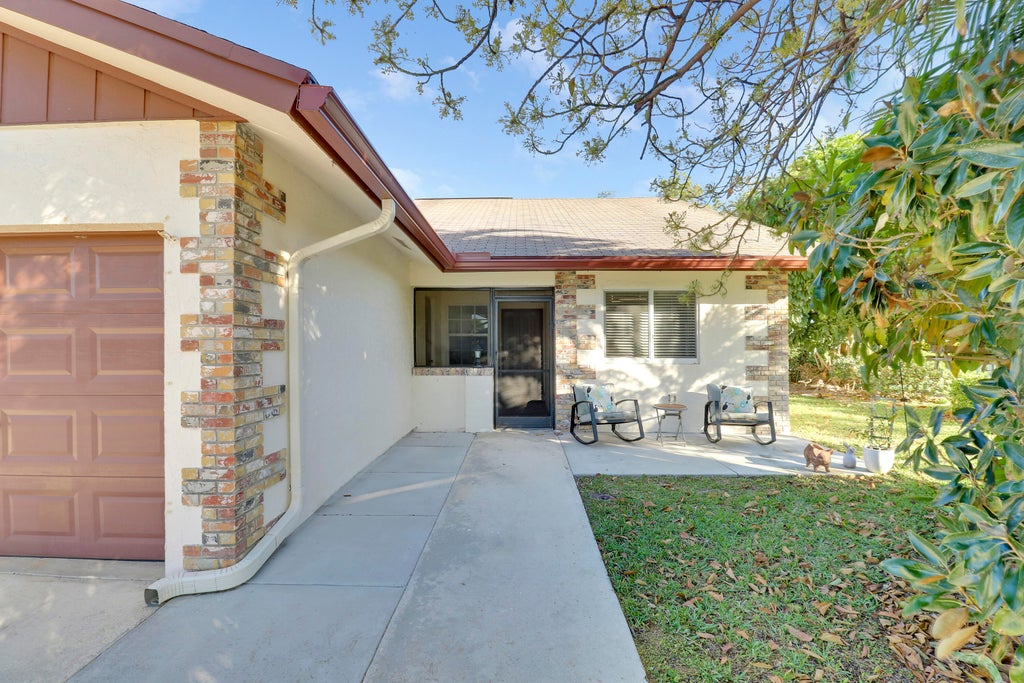 Photo of 106 S Moccasin Trail, Jupiter, FL 33458 (MLS # R11073225)