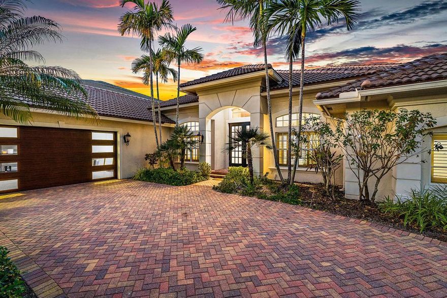 Accepting Back Up Offers! Welcome to your oasis on the Intracoastal Waterway! This stunning, newly renovated waterfront home offers a luxurious lifestyle with 100ft of direct access to South Florida's renowned Intracoastal Waterway. Whether you're a boat enthusiast or enjoy lounging in paradise, this spectacular property has it all! From its spacious open-concept layout with split bedrooms, granite countertops, and stainless-steel appliances in the kitchen, huge family room with French doors leading to the patio, and wet bar area complete with mini fridge and wine cooler to its incredible travertine paved patio featuring a built-in summer kitchen, cypress ceilings and spa-like pool/hot tub - every inch of this property will be sure to impress. You'll find 14' and tray ceilings in the