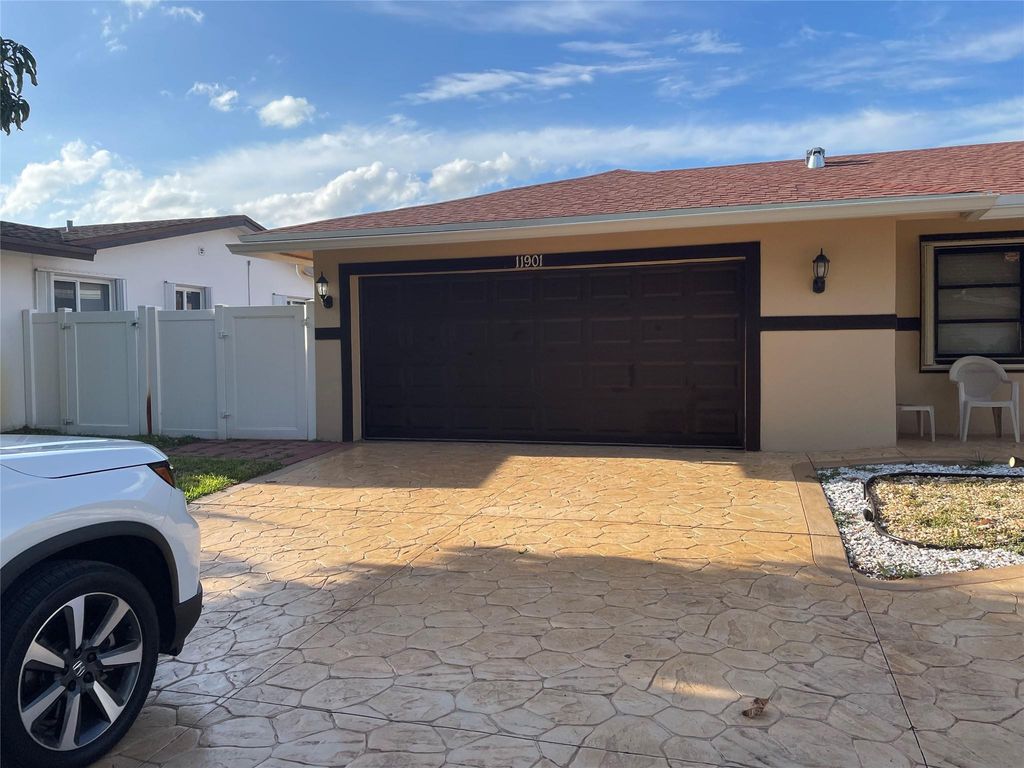 Photo of 11901 NW 15th Street, Pembroke Pines, FL 33026 (MLS # F10550219)
