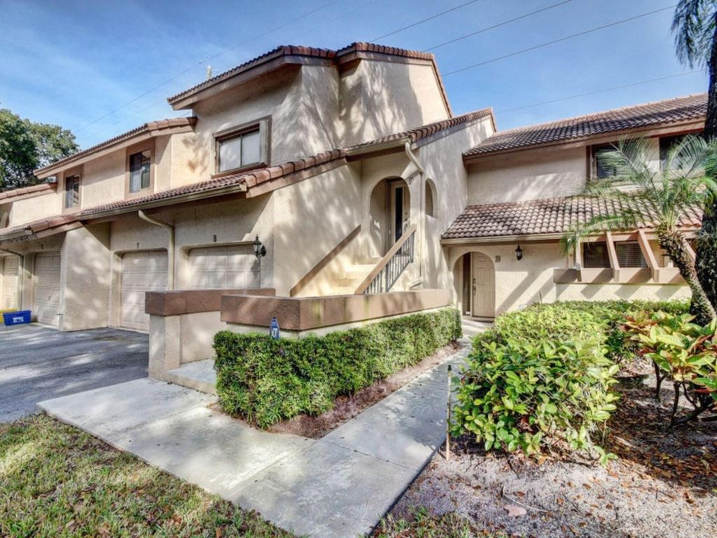 Photo of 5700 Coach House Circle #B, Boca Raton, FL 33486 (MLS # R11076817)