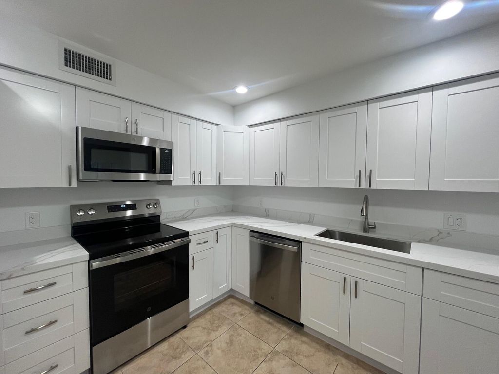 Photo of 5700 Coach House Circle #B, Boca Raton, FL 33486 (MLS # R11076817)