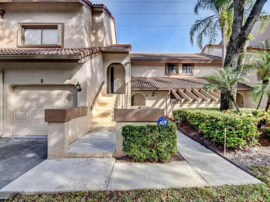 Photo of 5700 Coach House Circle #B, Boca Raton, FL 33486 (MLS # R11076817)