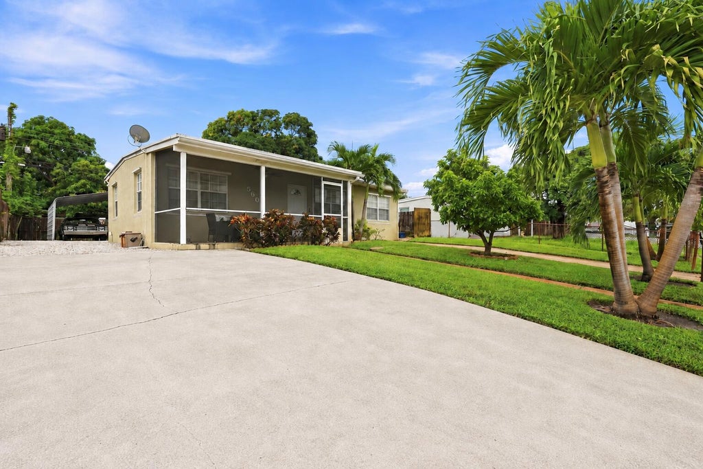 Photo of 560 Seagrape Road, Lantana, FL 33462 (MLS # B26073786)