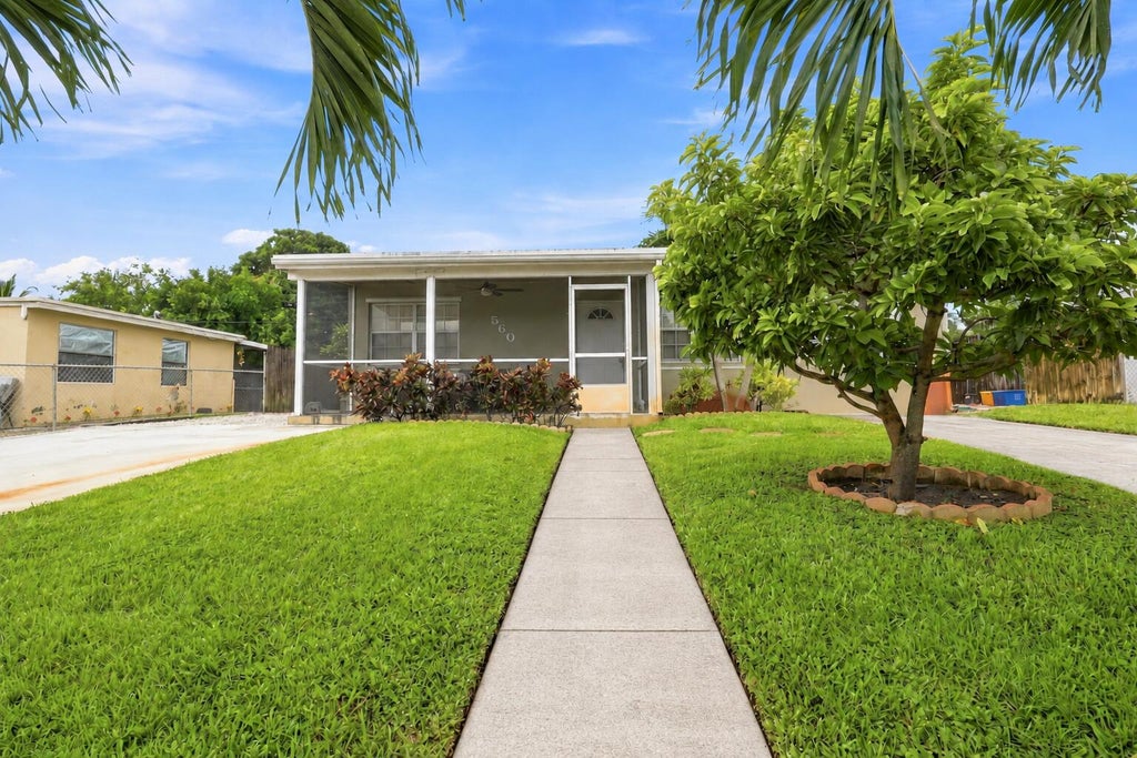 Photo of 560 Seagrape Road, Lantana, FL 33462 (MLS # B26073786)