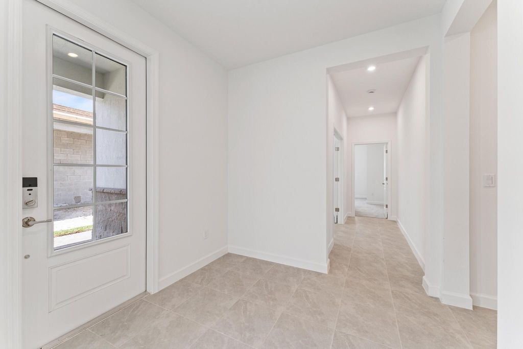 Photo of 9858 SW Veronese Drive, Port Saint Lucie, FL 34987 (MLS # R10986013)