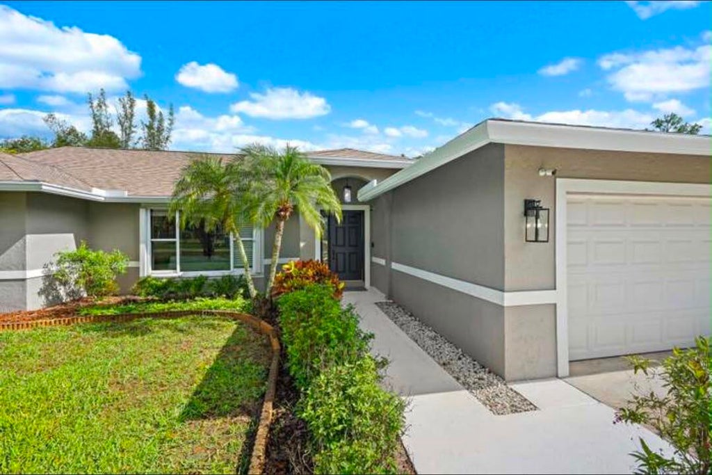 Photo of 12177 86TH RD N, The Acreage, FL 33412 (MLS # B26081060)