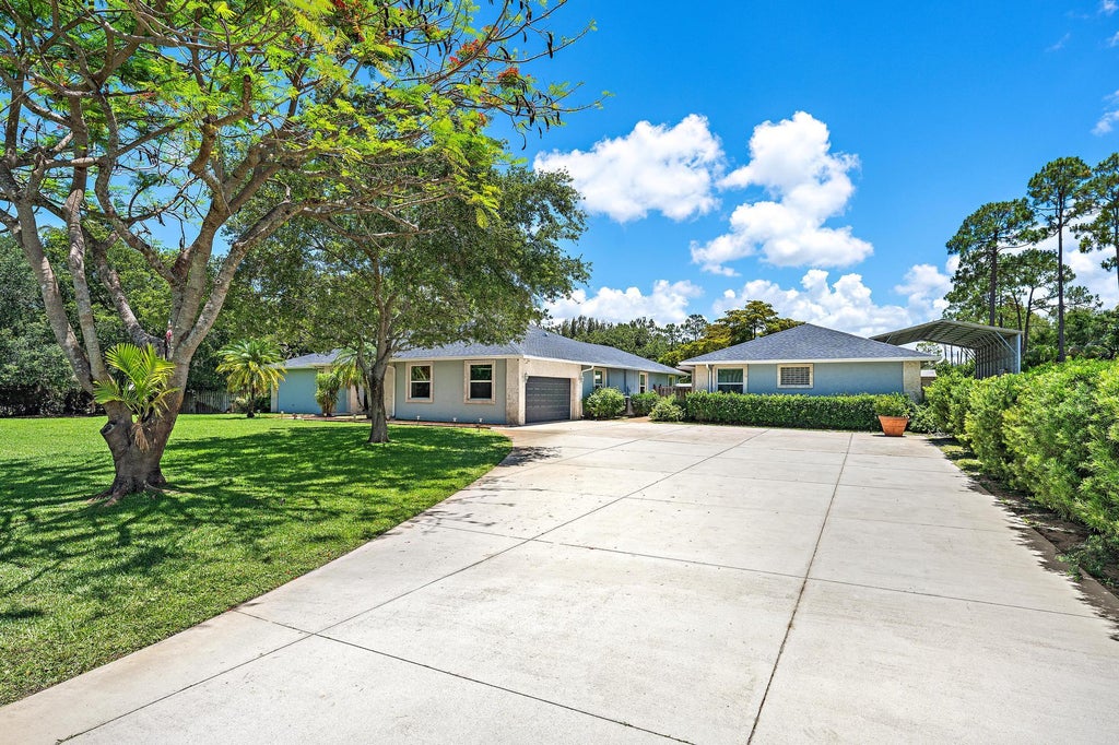 Photo of 13928 N 82nd Ln Lane N, The Acreage, FL 33412 (MLS # B26031584)