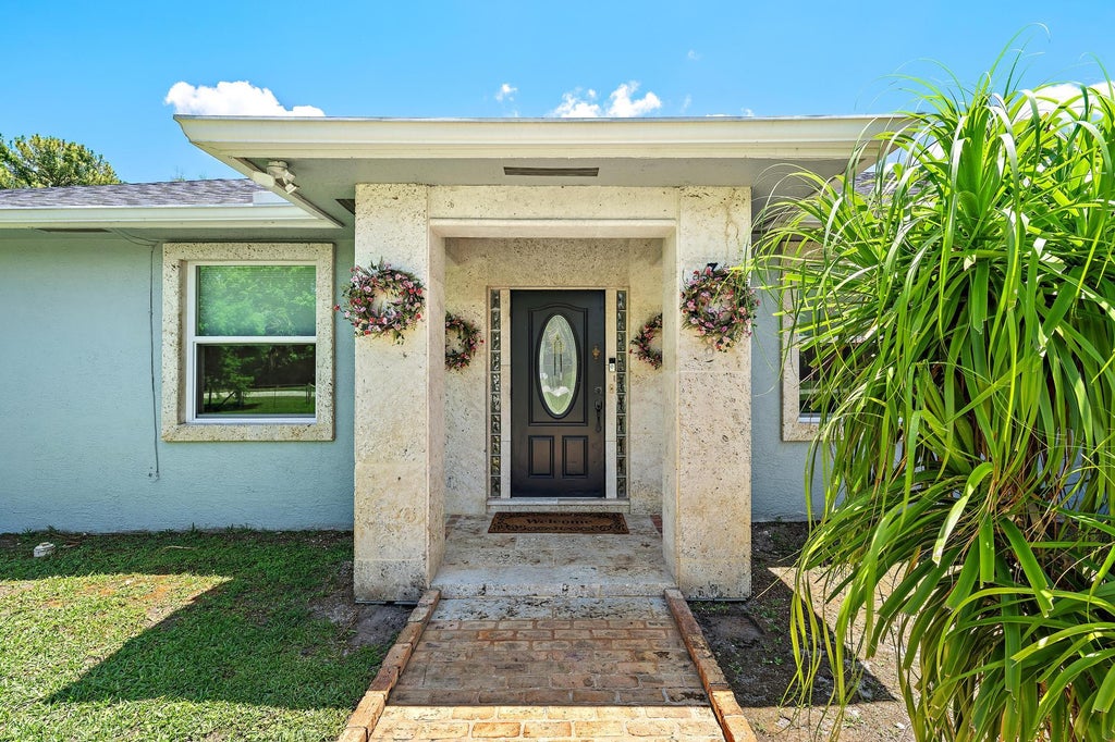 Photo of 13928 N 82nd Ln Lane N, The Acreage, FL 33412 (MLS # B26031584)