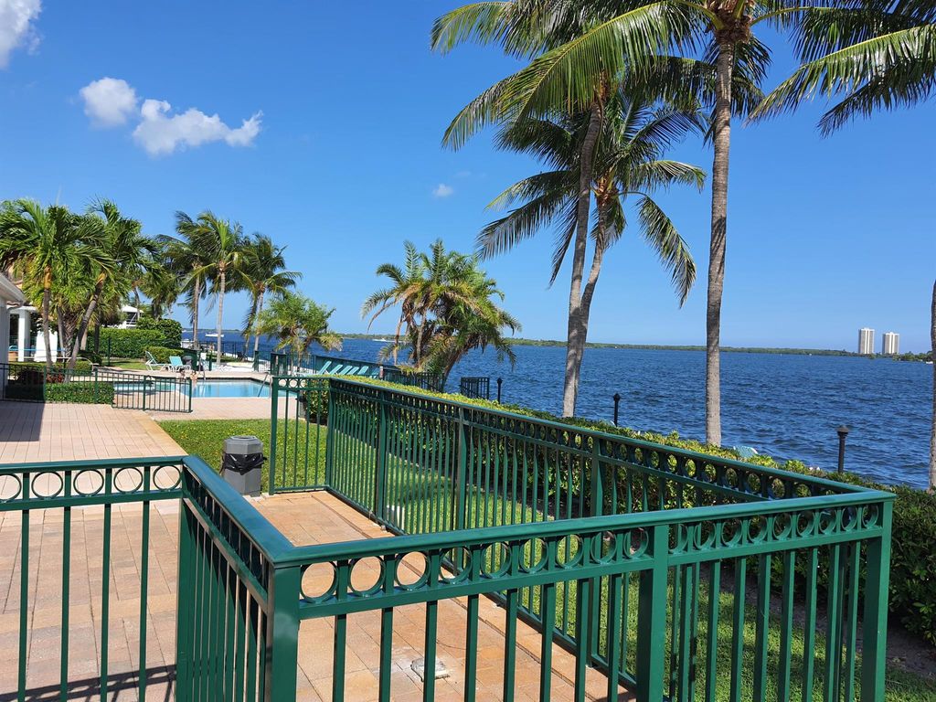 Photo of 1050 Lake Shore Drive #205, Lake Park, FL 33403 (MLS # R11008433)