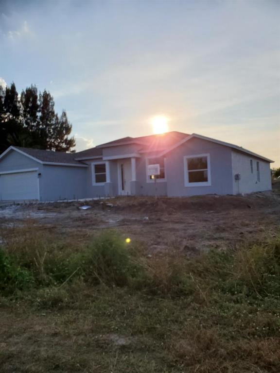 Photo of 1832 SW Kimberly Avenue, Port Saint Lucie, FL 34953 (MLS # R10699706)