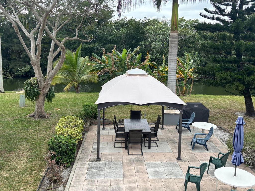 Photo of 106 Windsor E, West Palm Beach, FL 33417 (MLS # R11163649)