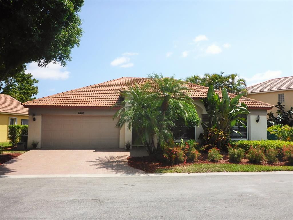 Photo of 7001 Galleon Cove, Riviera Beach, FL 33418 (MLS # R10707039)