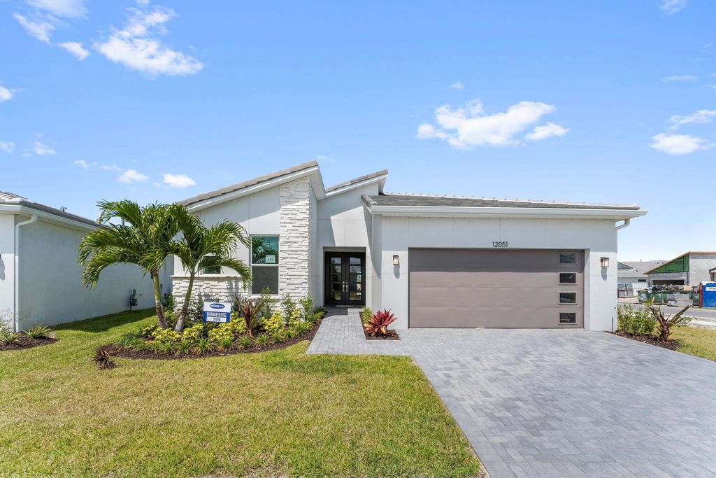 Photo of 12051 SW Toulon Street, Port Saint Lucie, FL 34987 (MLS # R10888953)