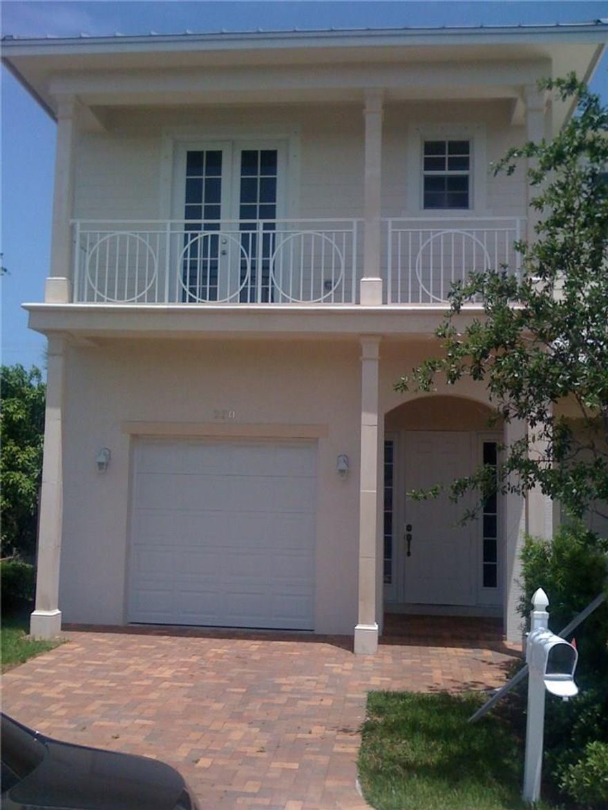 Large & Beautiful 2-story Townhouse at a great price! Elegant Porcelain tile downstairs & Pergo floors in Master & Guest bedrooms. Marble cladded showers with custom shower enclosures. Roman Tub, custom cabinets with elegant granite countertops on the kitchen & guest bathrooms. Natural stone kitchen bar, stainless steel appliances. Balconies cladded in Precast Stone. Spacious floor plan with 10' ceilings, large storage area. 1.7 miles from the beach, a couple of blocks from downtown LW, new Publix nearby.