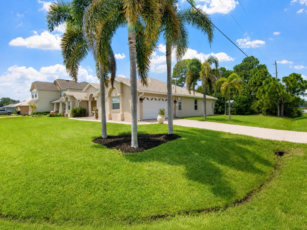 Photo of 3402 SW Edo Street, Port Saint Lucie, FL 34953 (MLS # B26069861)