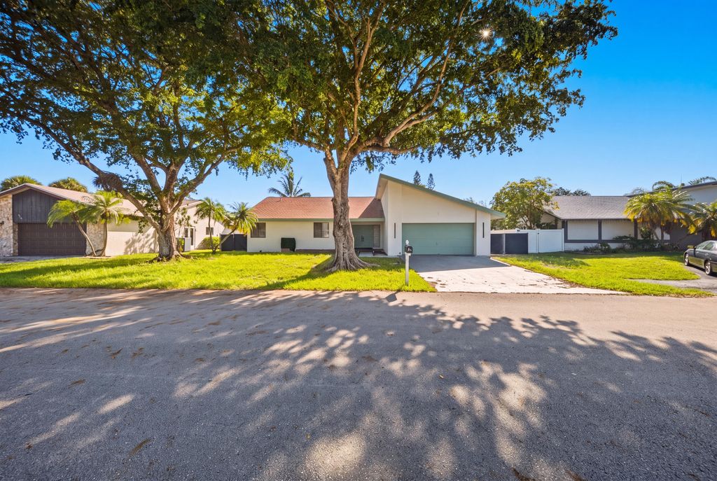Photo of 8114 NUTMEG Way, Tamarac, FL 33321 (MLS # B26054763)