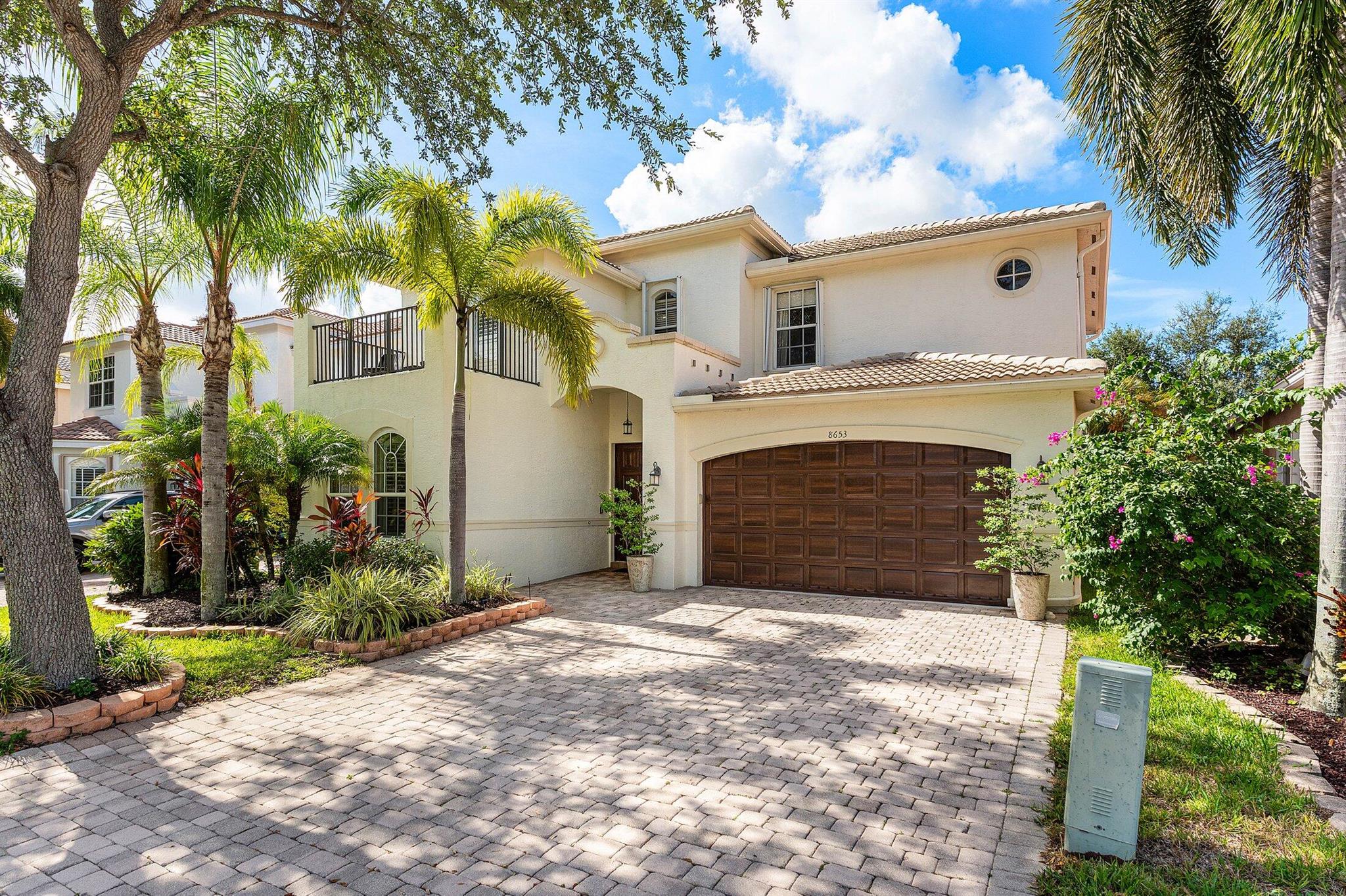 Gorgeous 5 Bedroom Pool Home in Canyon Isles. This Home Sits on a Culdesac and Offers Impact Glass for the 1st Floor and Accordion Shutters for the Second. Entering this Designer Showcase Notice the Oversized Baseboards and Custom Lighting Throughout. The Massive Guest Room on the 1st Floor is Currently Used as a Den and can be a Great Playroom or Home Theater with Surround Sound Wiring. The Incredible Kitchen is Huge & Includes a Large Center Island, Rich Wood Cabinetry and Stainless Steel Appliances. Head Out Back to Your Luxurious Resort Style Pool & Spa with Southern Exposure for all Day Sunlight. There is A Large Covered Patio Running the Entire Width of the Home as Well. Heading Upstairs a Wrought Iron Staircase with Oak Banister Leads to an Awesome Loft Area with Built In Fridge.