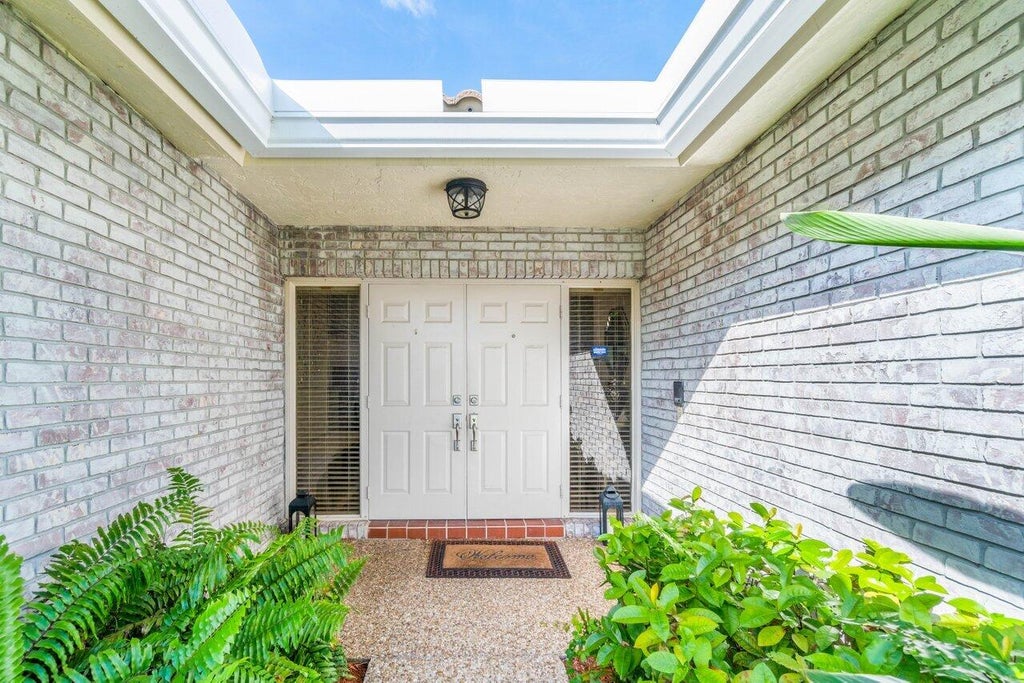 Photo of 2683 NW 45th Street, Boca Raton, FL 33434 (MLS # R10995320)