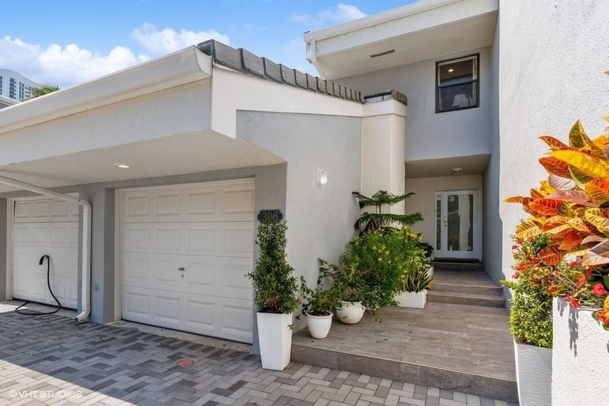 Deluxe Waterfront Townhouse at the Island Community of Poinciana Yacht & Racquet Club! On the Water w/Ocean Access & No Fixed Bridges. Across the street from the Beach!! Less than 2 Miles from the Haulover Inlet. Volume 2-story Ceiling w/Skylight. Car Garage. Preferred South-side of the complex!! The 3rd bedroom was extended to provide addtl space for an office/etc. Custom Kitchen, Quartz Tops, Glass Backsplash & High-end Stainless Steel Appliances. Newer roof. Impact Frt Door & Storm Shutters. Private 32’ Private Dock. Waterside Patio Area to enjoy daily boat parades. 24-hour manned Guardhouse. Resort-Style amenities incl Two Pools, Spa, Clubhouse featuring a New Fitness Ctr, Club Room, Sauna, Racquetball Courts, Basketball Courts & 4 Tennis Courts! Pet friendly! Good school district too!