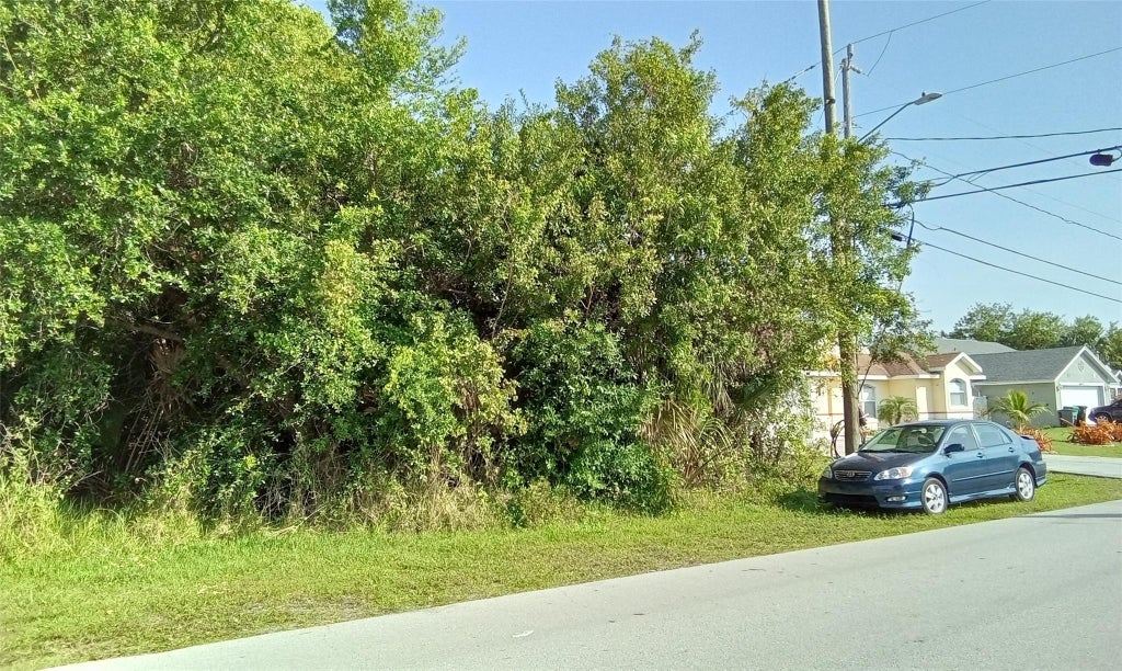 Photo of 1801 SE Mandrake Circle, Port Saint Lucie, FL 34952 (MLS # F10438495)