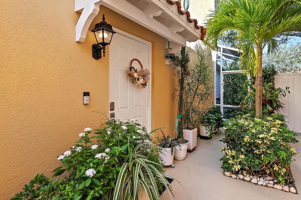 Photo of 79 TALL OAKS Circle, Tequesta, FL 33469 (MLS # B26091128)