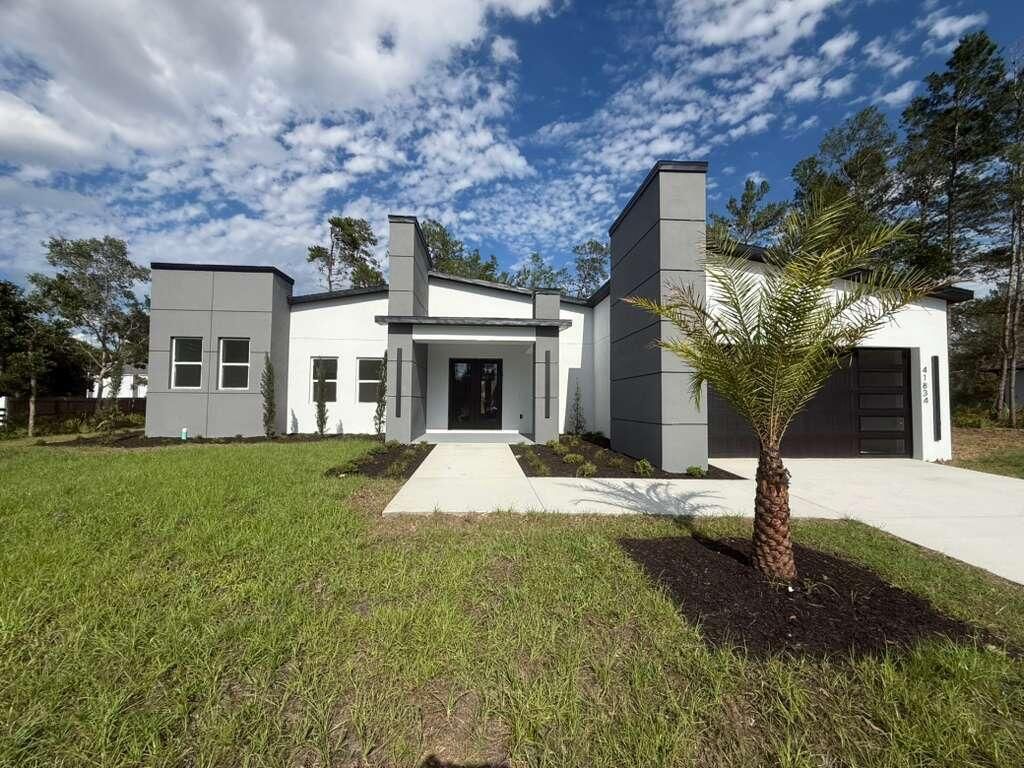Photo of 41834 Mango Street, Eustis, FL 32736 (MLS # B26024136)
