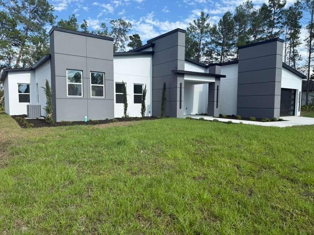 Photo of 41834 Mango Street, Eustis, FL 32736 (MLS # B26024136)
