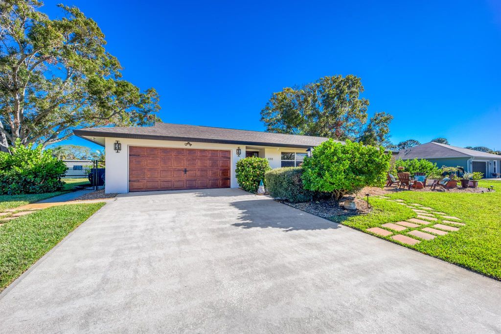 Photo of 697 NE Horizon Lane, Port Saint Lucie, FL 34983 (MLS # R11042656)