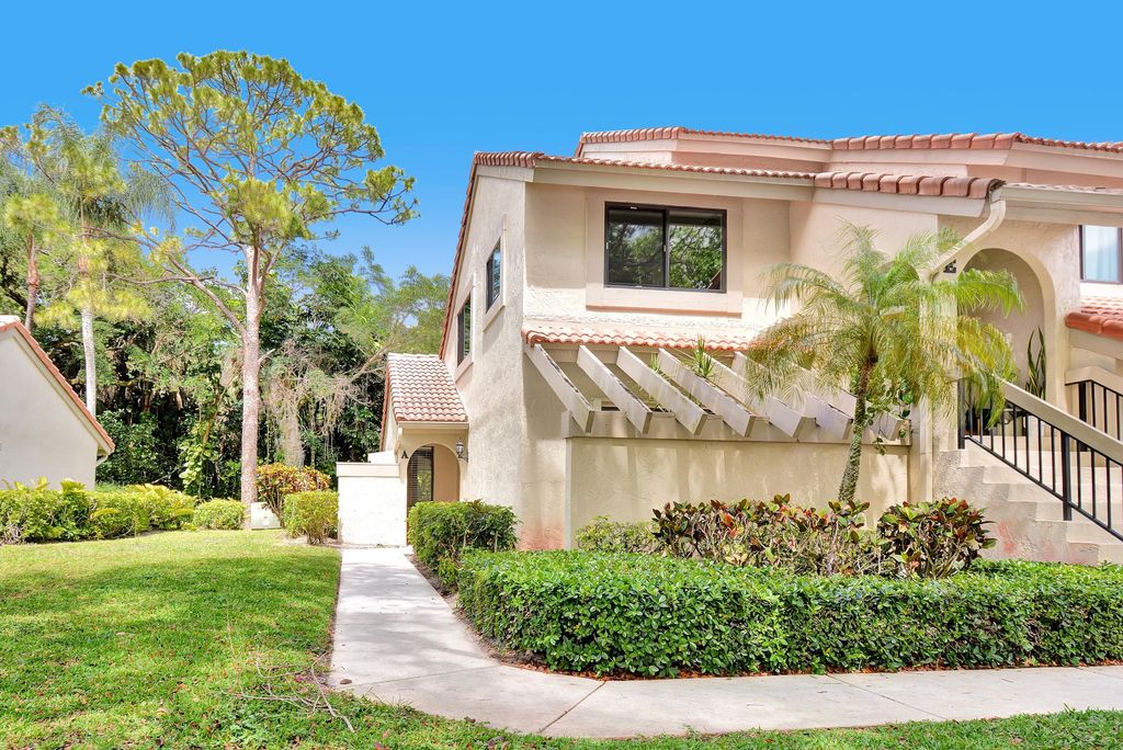 Photo of 5590 Coach House Circle #A, Boca Raton, FL 33486 (MLS # B26019436)