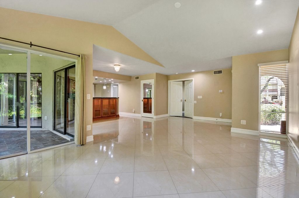 Photo of 5590 Coach House Circle #A, Boca Raton, FL 33486 (MLS # B26019436)