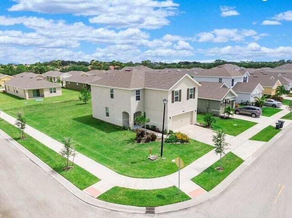 Photo of 11242 SW Sophronia Street, Port St Lucie, FL 34987 (MLS # R10882706)