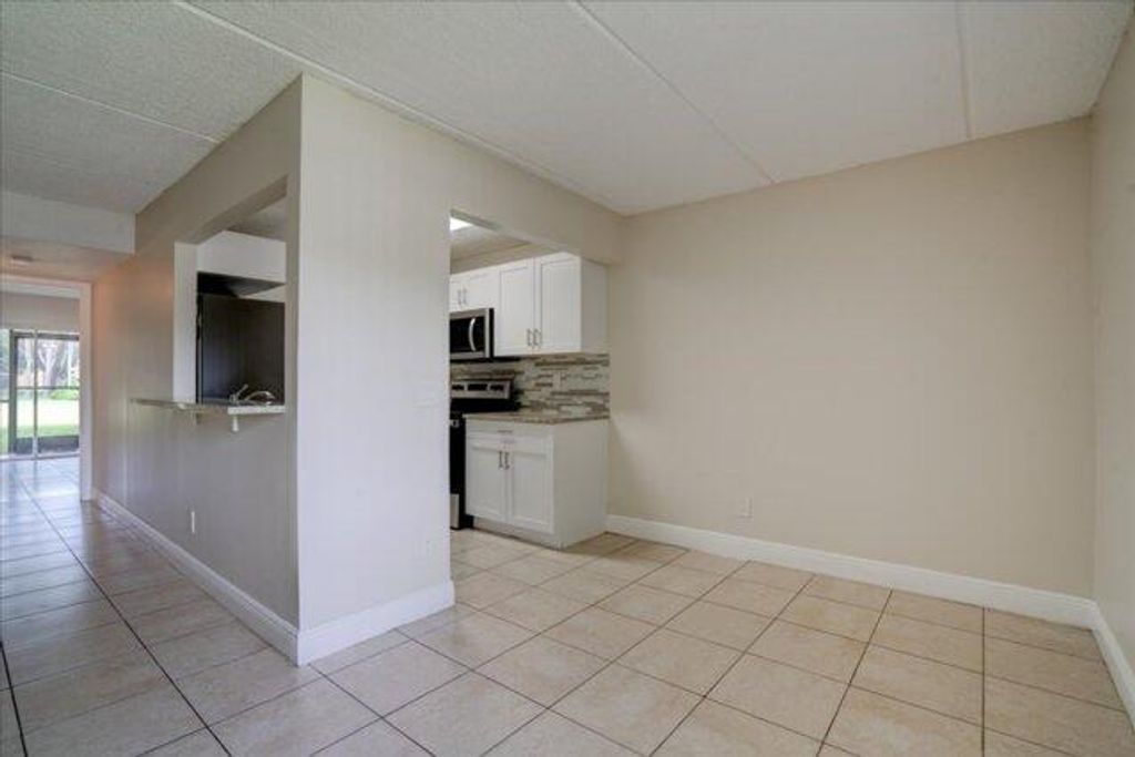 Photo of 1104 Meadows Circle #1104, Boynton Beach, FL 33436 (MLS # R11124321)