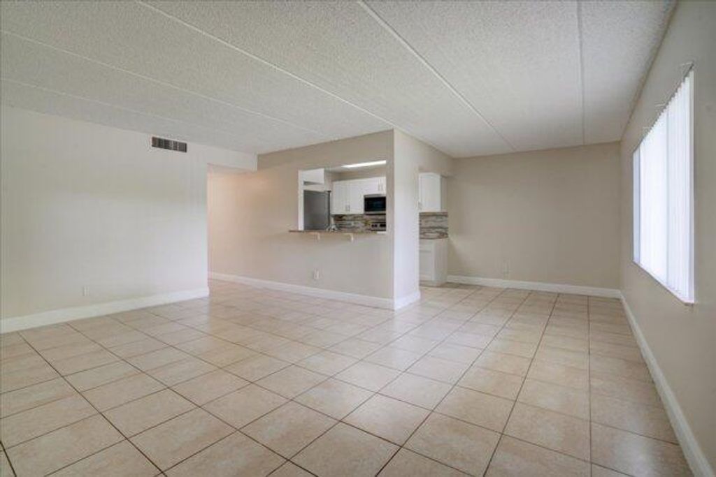 Photo of 1104 Meadows Circle #1104, Boynton Beach, FL 33436 (MLS # R11124321)
