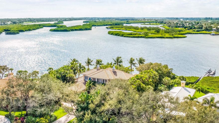 Southern exposure riverfront! Exceptional view across wide water toward Loggerhead Point. Direct Intracoastal access. This stately residence is move-in ready. 2023 roof. Impact glass. Water view from most rooms. Grand living room and formal dining room offer traditional spaces plus a large eat-in island kitchen and family room giving onto a covered veranda with summer kitchen and outdoor fireplace. Freshly rejuvenated heated pool/spa for outstanding Florida living. Downstairs primary suite, library and guest suite. Upstairs living area, 2 en suite guest rooms. Dock/lift DISCLAIMER: Information published or otherwise provided by the listing company and its representatives including but not limited to prices, measurements, square footages, lot sizes, calculations, statistics, and videos are deemed reliable but are not guaranteed and are subject to errors, omissions or changes without notice. All such information should be independently verified by any prospective purchaser or seller. Parties should perform their own due diligence to verify such information prior to a sale or listing. Listing company expressly disclaims any warranty or representation regarding such information. Prices published are either list price, sold price, and/or last asking price. The listing company participates in the Multiple Listing Service and IDX. The properties published as listed and sold are not necessarily exclusive to listing company and may be listed or have sold with other members of the Multiple Listing Service. Transactions where listing company represented both buyers and sellers are calculated as two sales. Some affiliations may not be applicable to certain geographic areas. If your property is currently listed with another broker, please disregard any solicitation for services. Information published or otherwise provided by seller, listing company or its representatives is deemed reliable but are not guaranteed and subject to errors, omissions, or changes without notice. Copyright 2025 by the listing company. All Rights Reserved.   

DISCLAIMER:  Information published or otherwise provided by seller, listing company or its representatives is deemed reliable but are not guaranteed and subject to errors, omissions, or changes without notice.