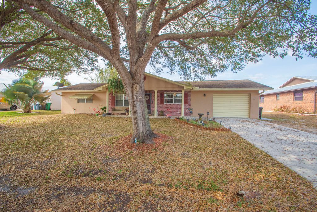 Photo of 1686 SE Biddle Lane, Port Saint Lucie, FL 34983 (MLS # R11165937)