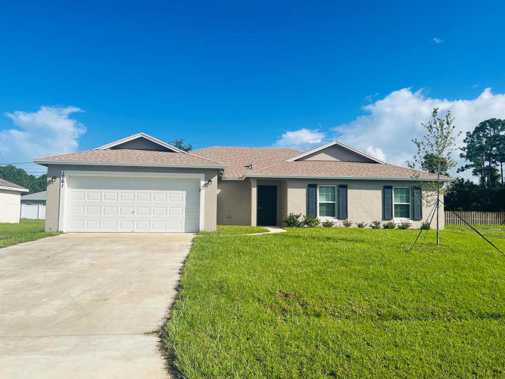 Photo of 1761 SW Haylake Avenue, Port St Lucie, FL 34953 (MLS # R10925428)