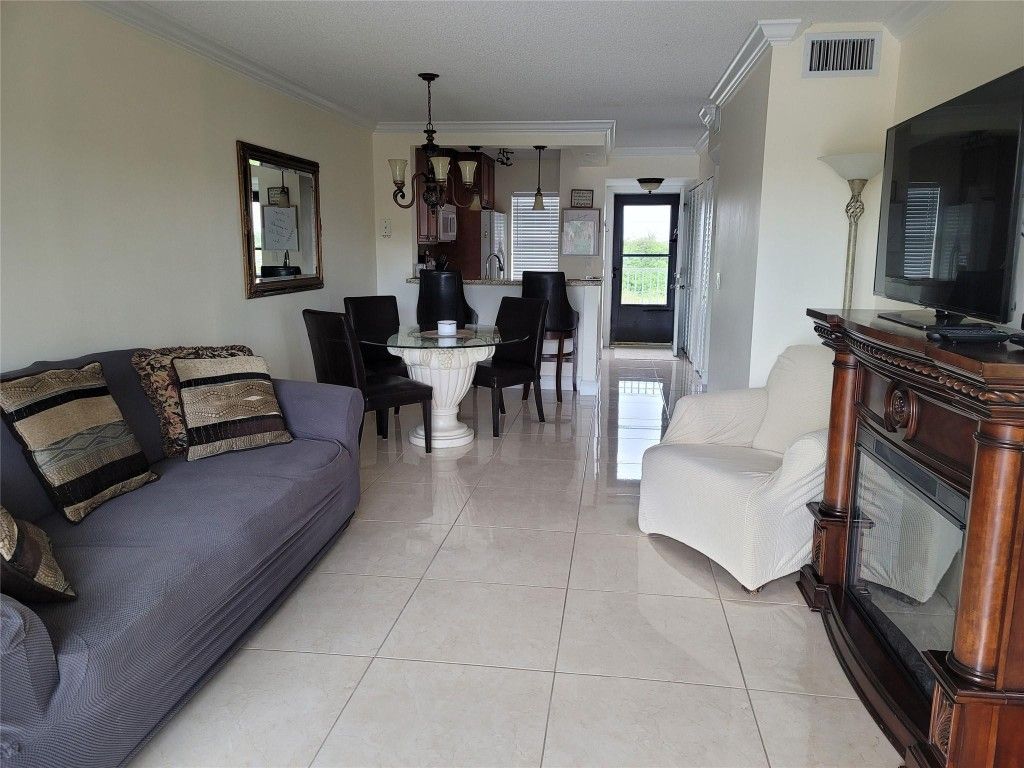 Photo of 2220 N Cypress Bend Drive #402, Pompano Beach, FL 33069 (MLS # F10462642)