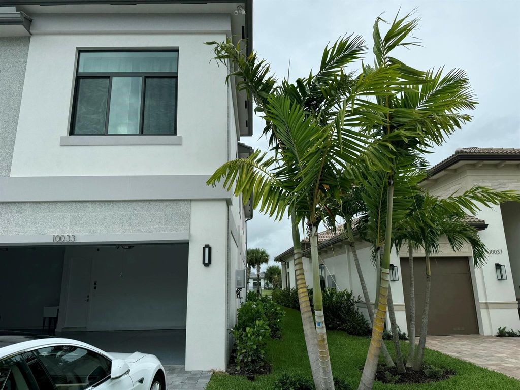 Photo of 10033 Stockrun Drive, Palm Beach Gardens, FL 33412 (MLS # R11114441)