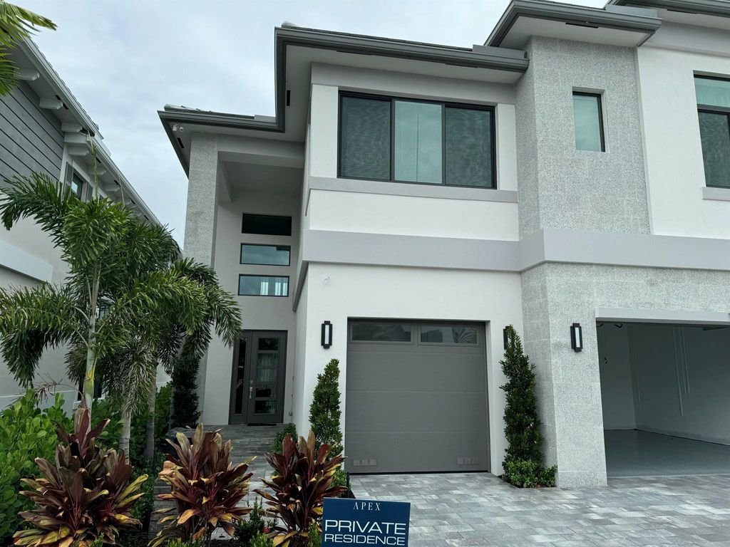 Photo of 10033 Stockrun Drive, Palm Beach Gardens, FL 33412 (MLS # R11114441)