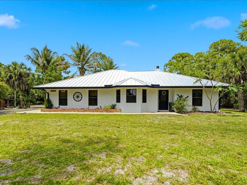 Photo of 17857 N 82ND Road N, The Acreage, FL 33470 (MLS # B26074395)