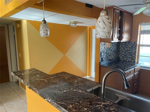 Tiny photo for 1025 Country Club Drive #407, Margate, FL 33063 (MLS # F10529297)